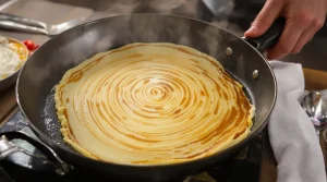 Pâte à crêpes de Christophe Michalak : le secret d'une recette ultra-légère, express sans repos et avec peu d’œufs